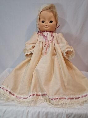 Vintage Cream Baby Doll in Lace Dress with Pink Ribbon